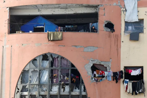 عصابة مسلحة مدعومة إسرائيلياً تحرق منازل في غزة